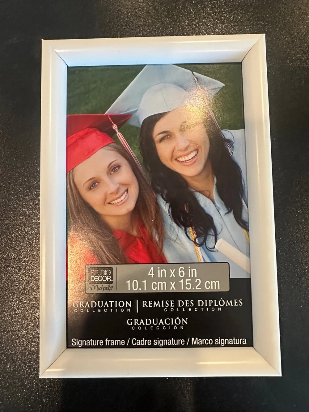 Photo frame with blackboard for messages.